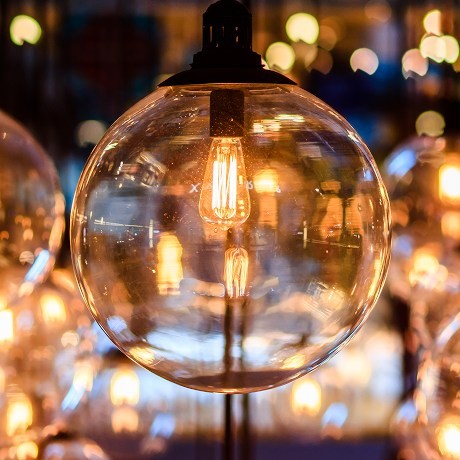 Modern amber LED lighting in a glass sphere.