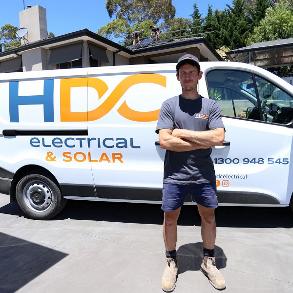 Owner of HDC, in front of a residential electrician job.